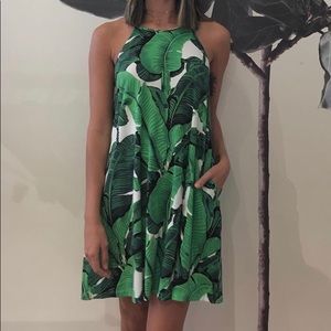 Ava Sky dress with pockets “Palmy print”